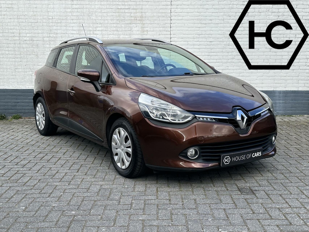 Renault Clio Estate - 1.2 16V Collection Clima Cruise Navi PDC - AutoWereld.nl