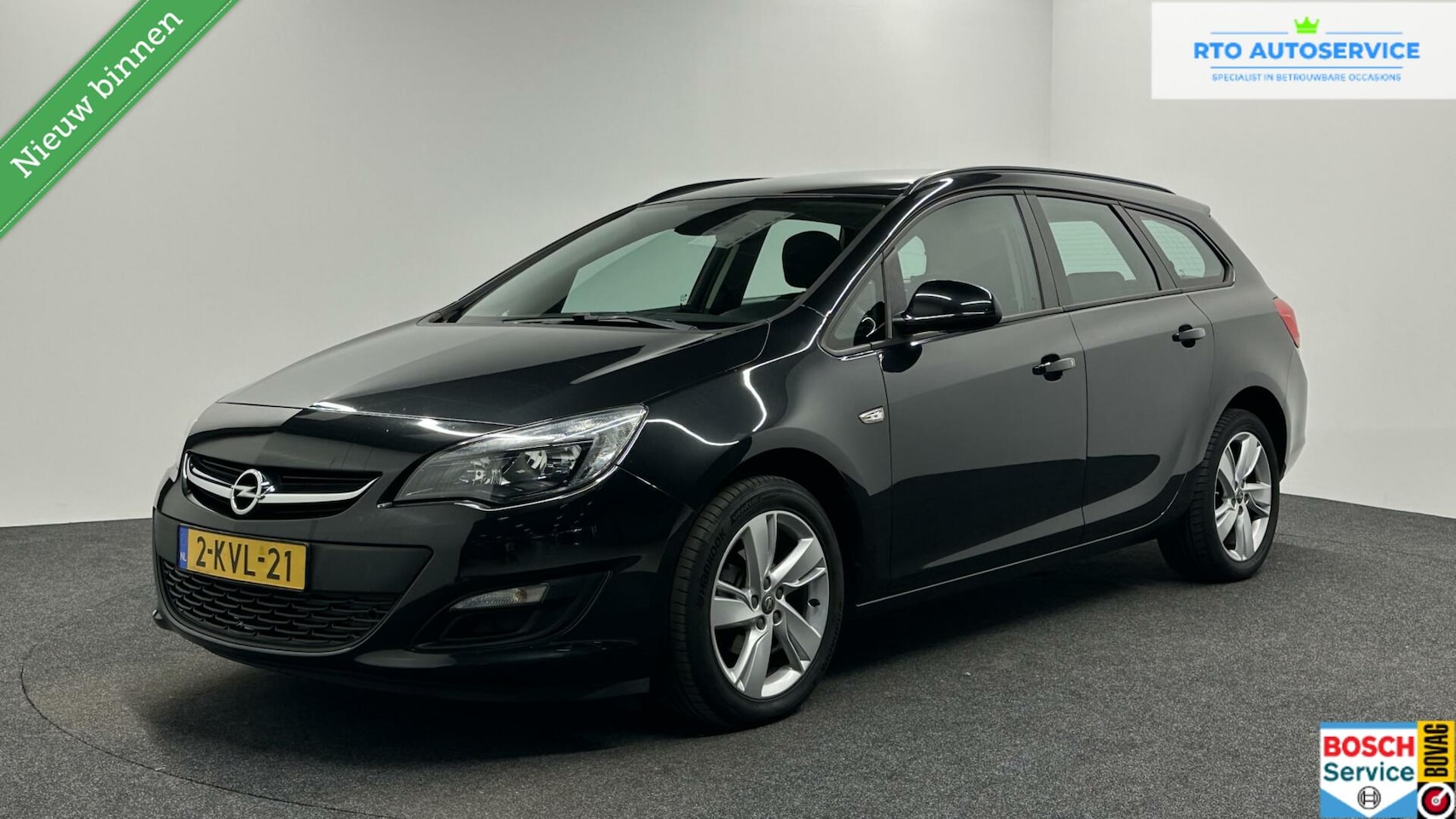 Opel Astra Sports Tourer - 1.4 Turbo Business + TREKHAAK NAVI LM - AutoWereld.nl