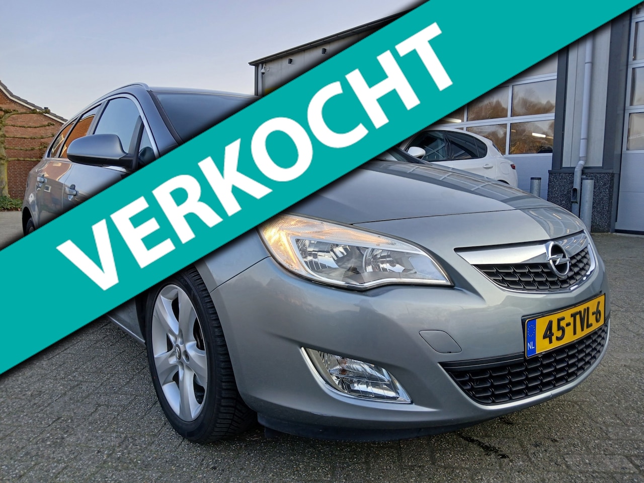 Opel Astra Sports Tourer - 1.4 Turbo Cosmo - Trekhaak - Navigatie - AutoWereld.nl