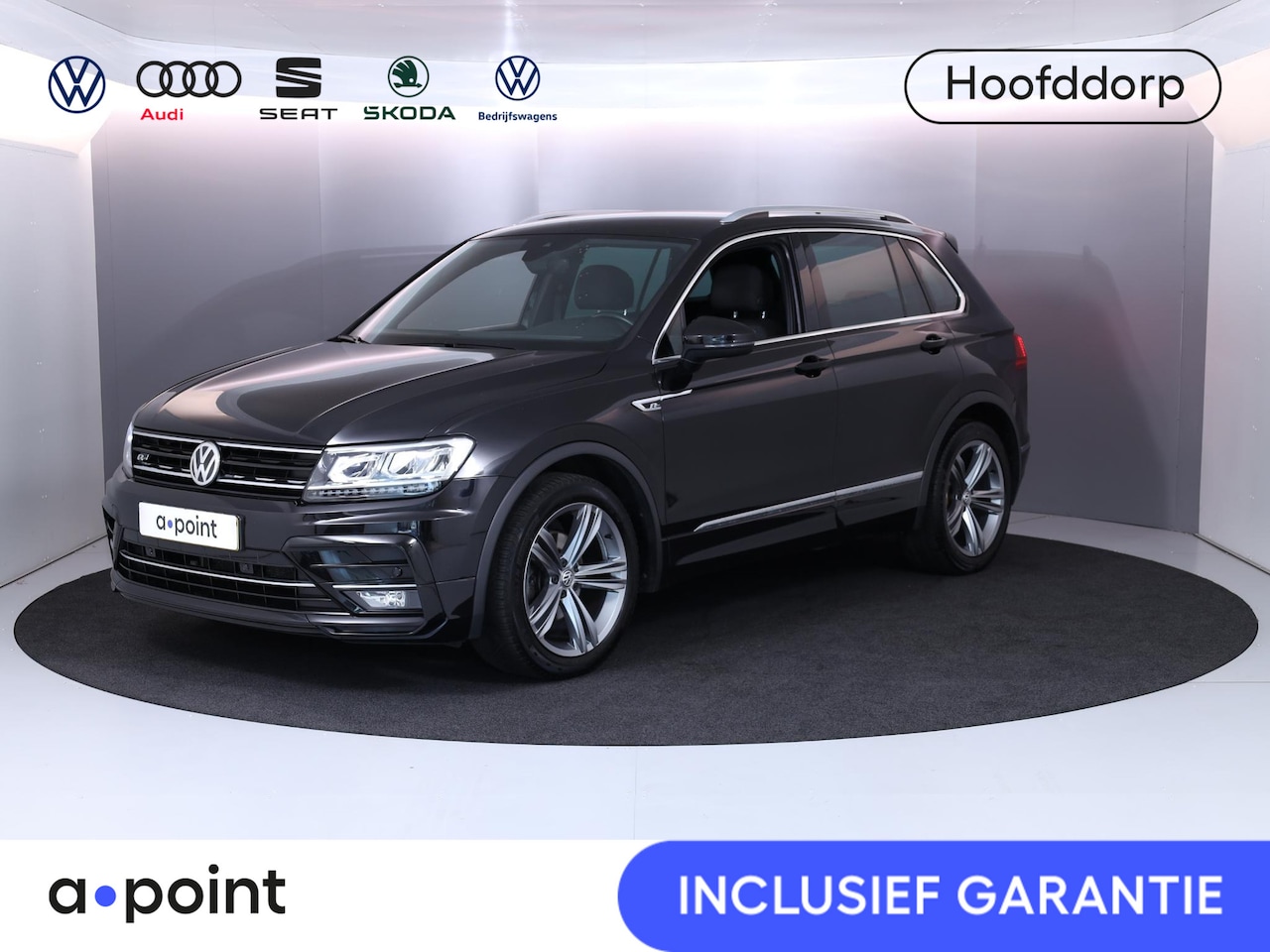 Volkswagen Tiguan - 1.5 TSI Comfortline Business 130pk 6bak/ Rline-ext| trekhaak|Navi| 19'LM-velgen| digital d - AutoWereld.nl