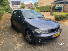 BMW 1-serie - 118i High Executive met leer, airco en 17" NAP