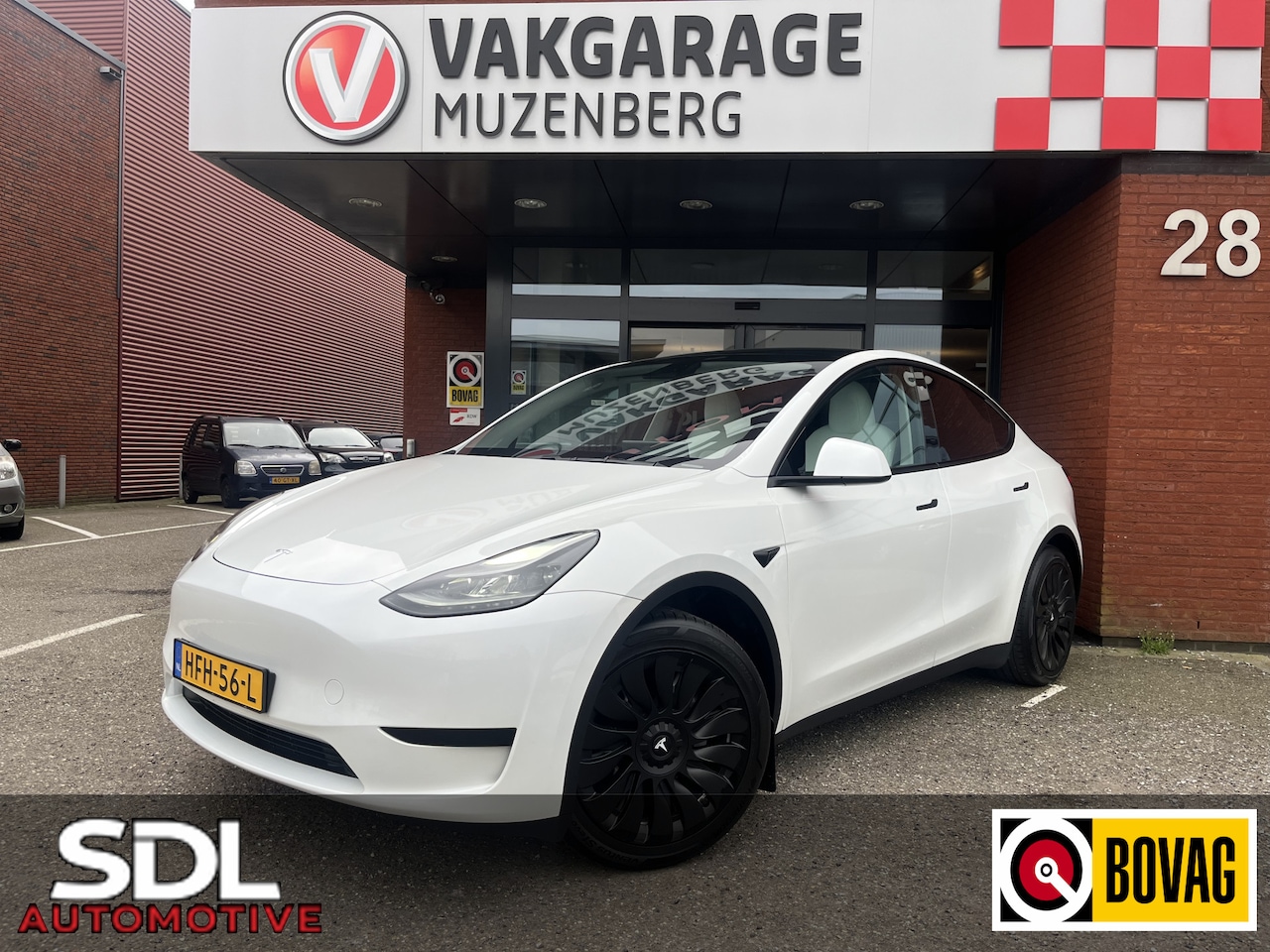 Tesla Model Y - RWD 58 kWh // PANODAK // NAVI // ADAPTIVE CRUISE // CLIMA // AUTOPILOT - AutoWereld.nl