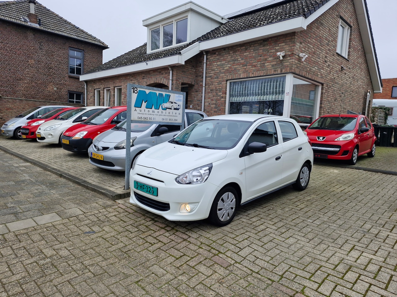 Mitsubishi Space Star - 1.0 Entry airco 12 mnd apk grotebeurt - AutoWereld.nl