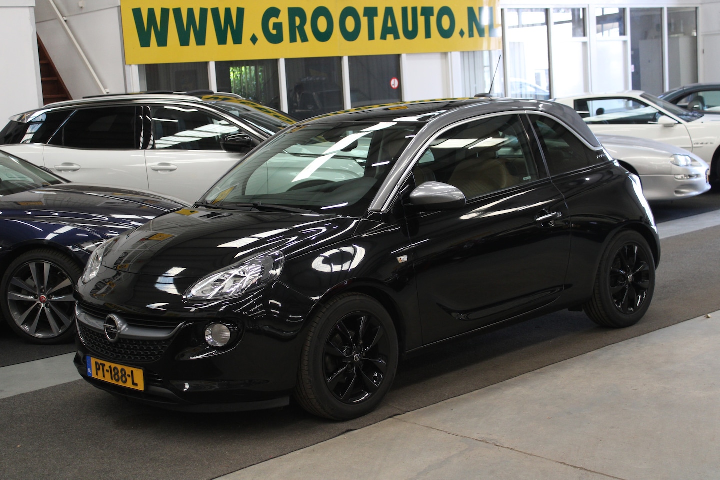 Opel ADAM - 1.0 Turbo Unlimited Panoramadak, Airco, Nap, Cruise control - AutoWereld.nl