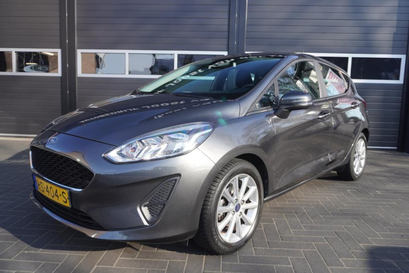 Ford Fiesta - 1.1 Trend Airco/Navi/CC/Park.sensoren - AutoWereld.nl