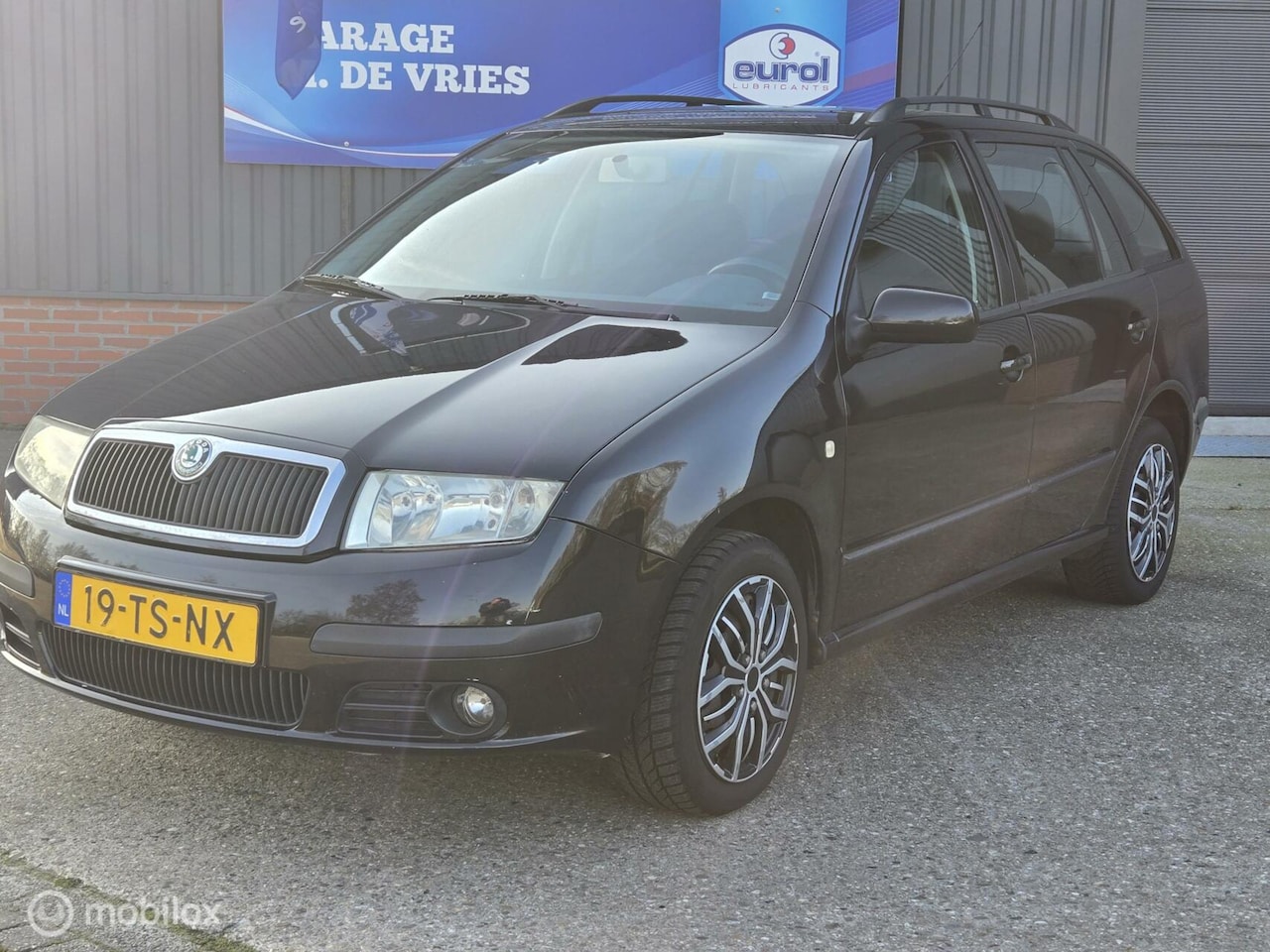 Skoda Fabia Combi - 1.4-16V Spirit+,cruise,airco, 5 drs - AutoWereld.nl