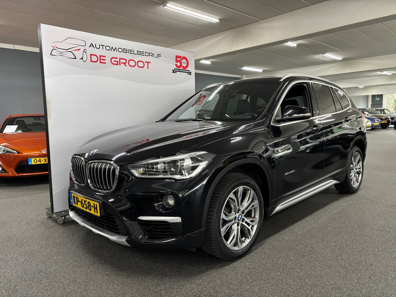 BMW X1 - SDrive20i Centennial High Executive / NL-auto, Automaat, Stoelverwamring - AutoWereld.nl