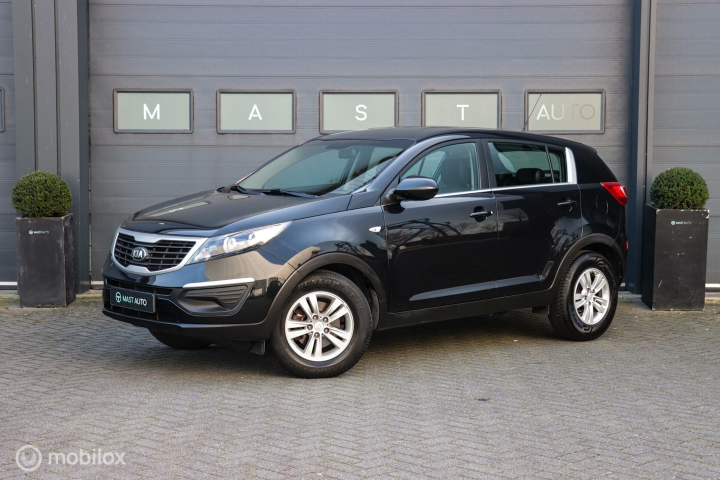 Kia Sportage - 1.6 GDI|NAP|Leder|Airco|Trekhaak| - AutoWereld.nl