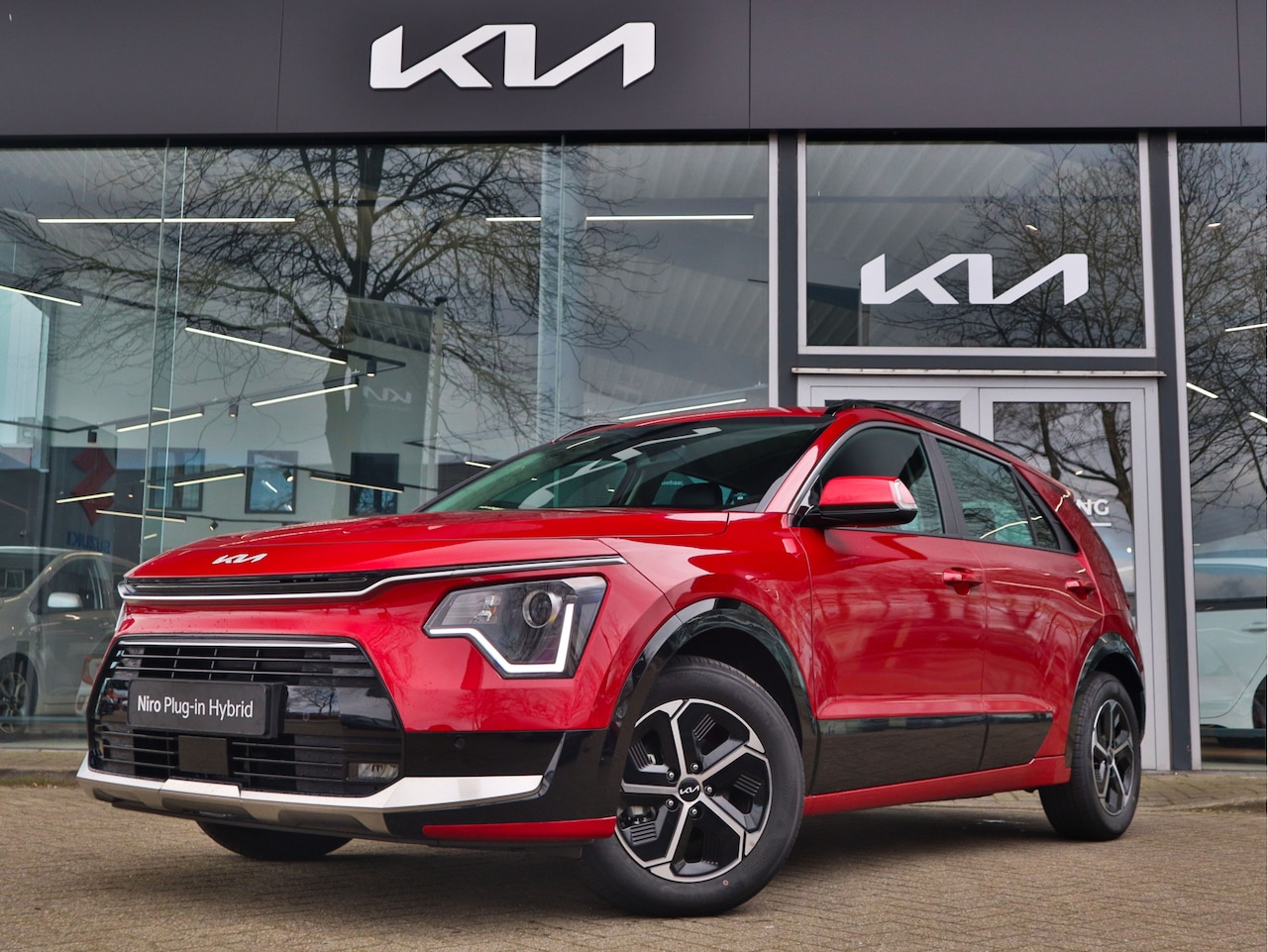 Kia Niro - 1.6 GDi Hybrid DynamicLine Navi+BT+Cam Cr. Control PDC Stoel+Stuurverw. tot 10 jr. Garanti - AutoWereld.nl