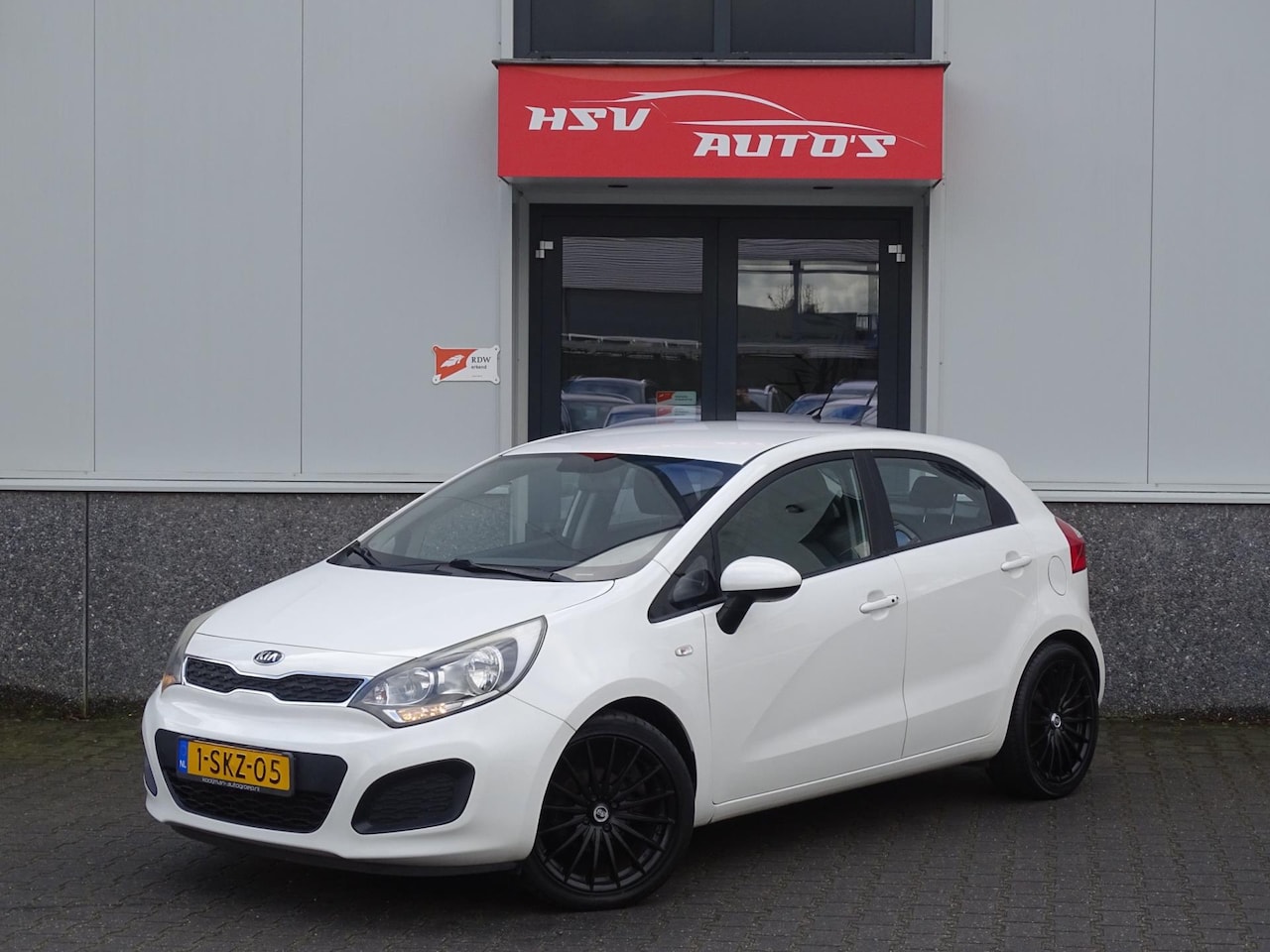 Kia Rio - 1.2 CVVT Comfort Pack airco cruise org NL - AutoWereld.nl