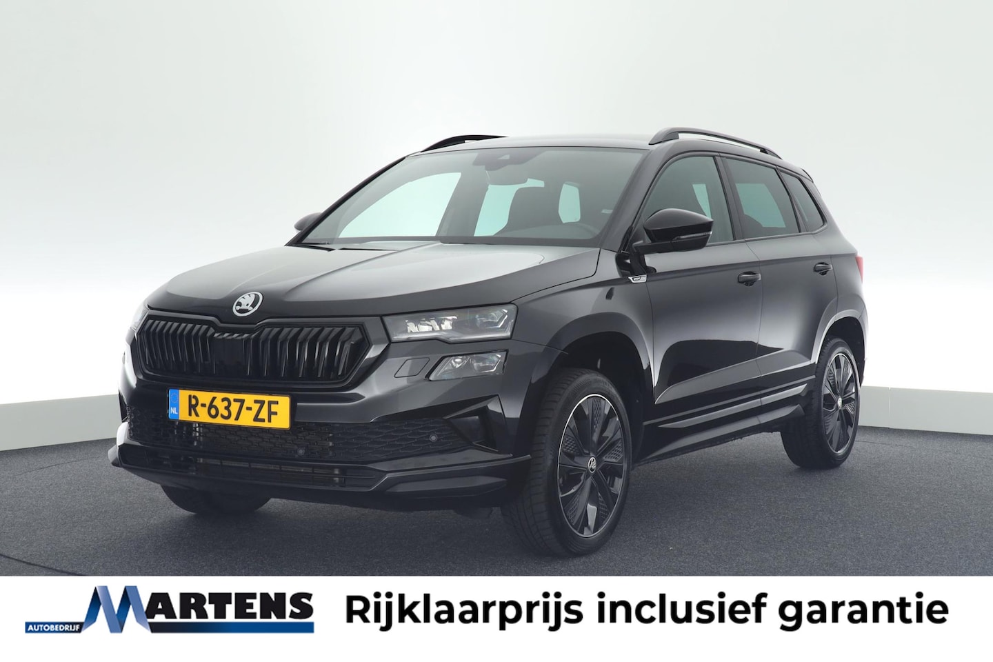 Skoda Karoq - 1.5 TSI 150pk DSG ACT Sportline Business Trekhaak Camera Stoelverwarming Keyless Navigatie - AutoWereld.nl