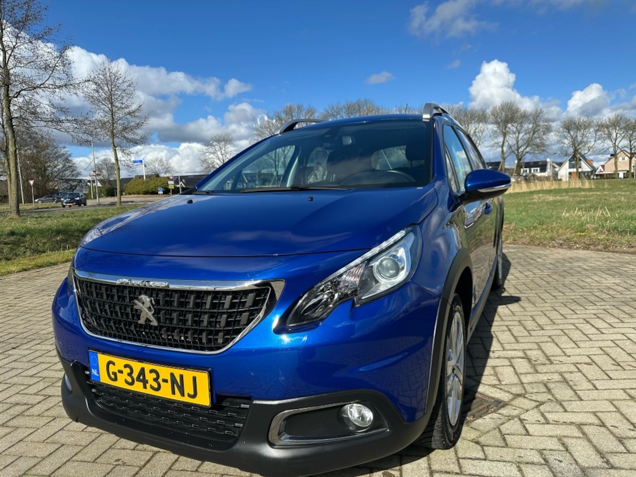 Peugeot 2008 - 1.2 PureT. Signature - AutoWereld.nl