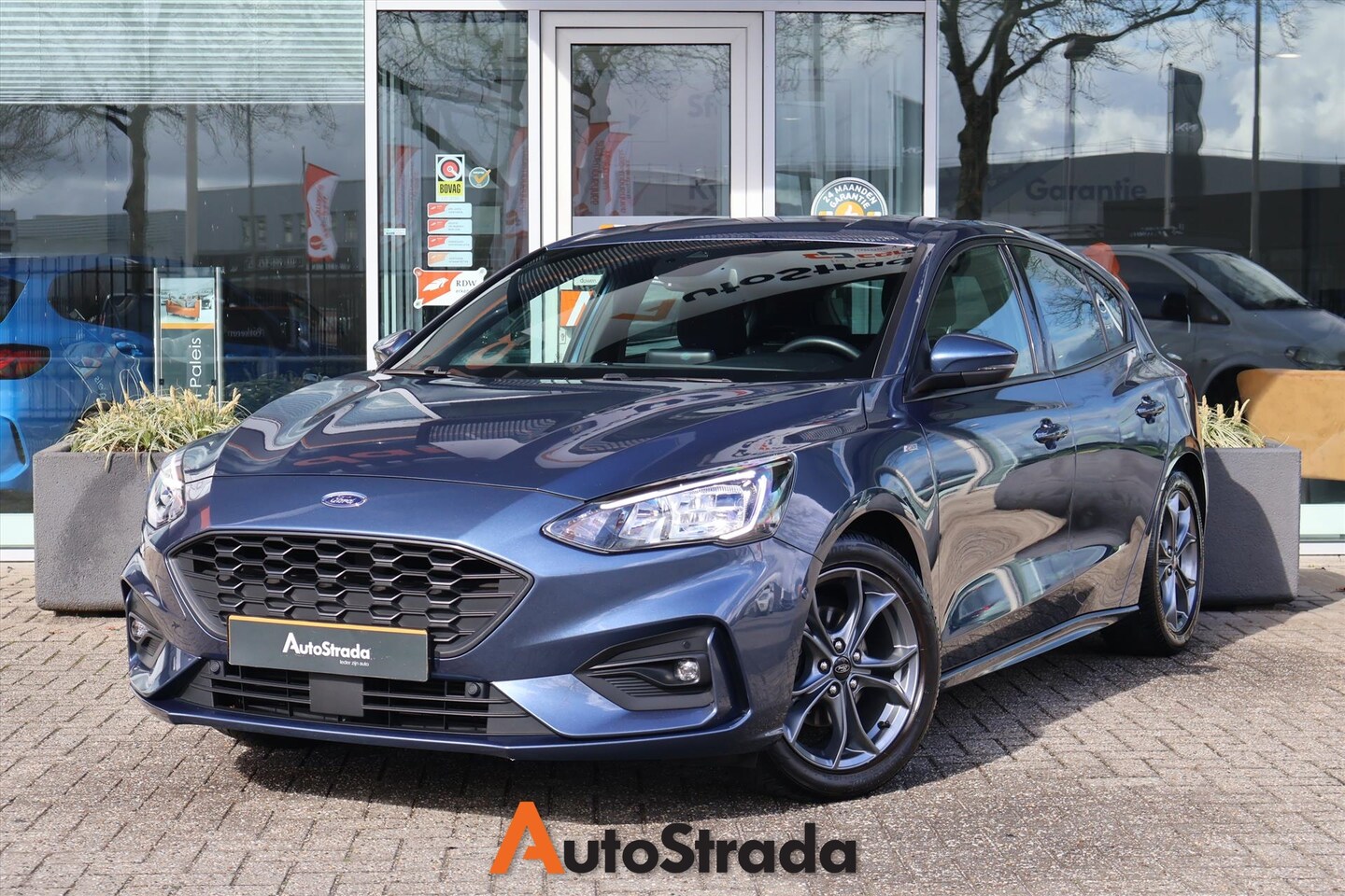 Ford Focus - 1.0 ST-Line EcoBoost 125pk | Keyless | B&O | Camera | Trekhaak | Navi | Stoelverwarming - AutoWereld.nl