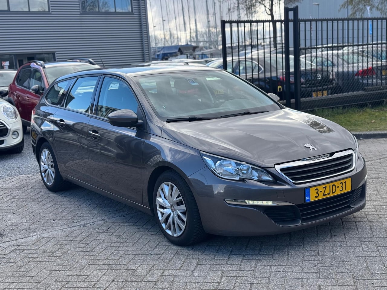 Peugeot 308 SW - 1.6 BlueHDI Blue Lease Navi Clima - AutoWereld.nl