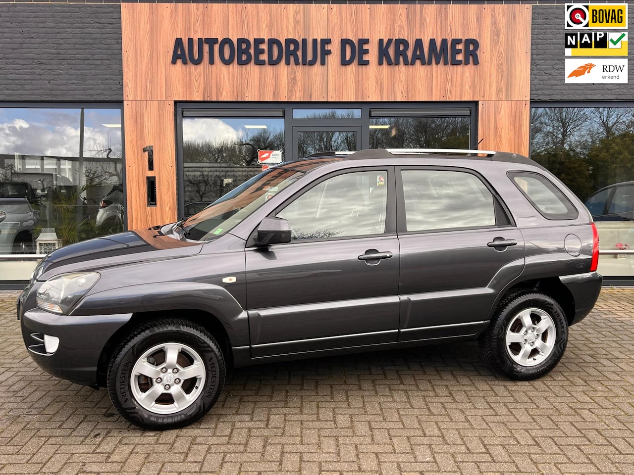 Kia Sportage - 2.0 CVVT X-ecutive 2.0 CVVT X-ecutive - AutoWereld.nl