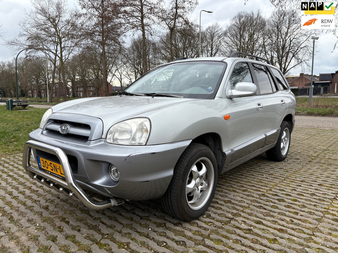 Hyundai Santa Fe - 2.4i-16V Elite / airco / leder / cruise control / nieuwe apk / schuifdak - AutoWereld.nl