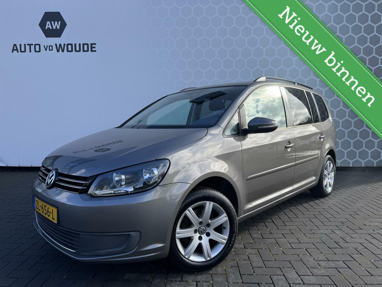 Volkswagen Touran - 1.6 TDI Highline BlueMotion 7p. 1.6 TDI Highline BlueMotion 7p. Trekhaak - AutoWereld.nl