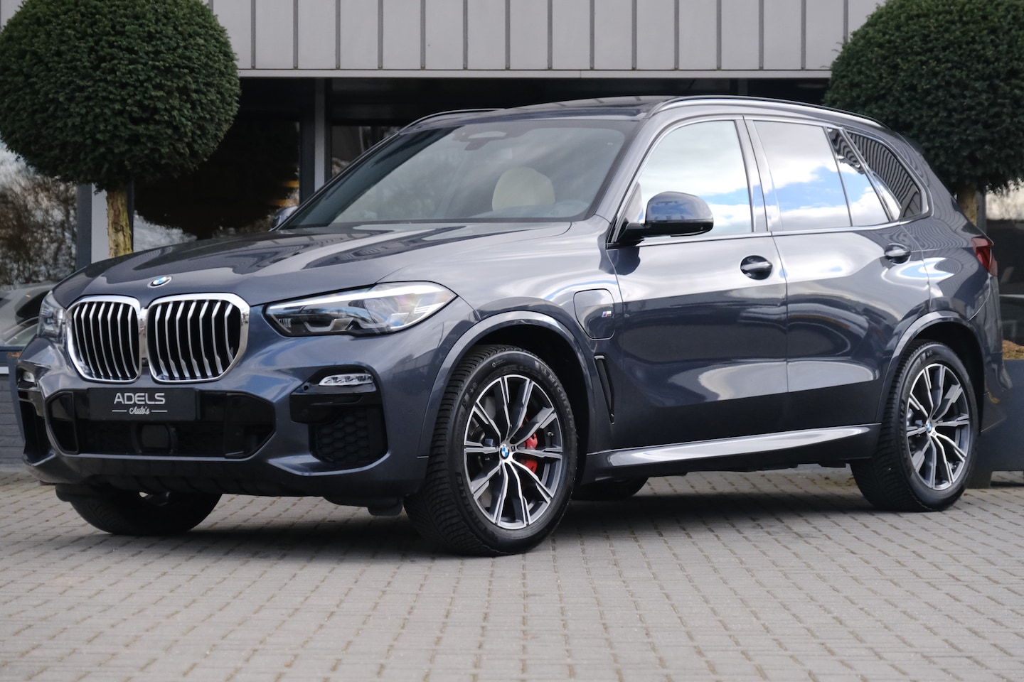 BMW X5 - xDrive45e High Executive M Sport Skylounge PANO ACC HUD Harman Kardon 4Wielsturing - AutoWereld.nl