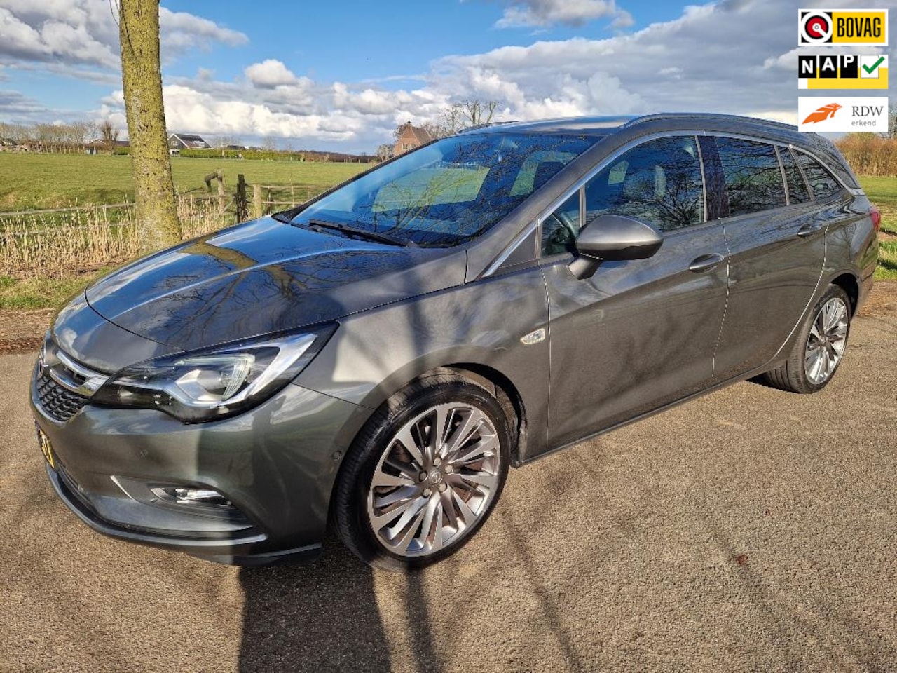 Opel Astra Sports Tourer - 1.6 Turbo Innovation, navi, elctr.klep - AutoWereld.nl