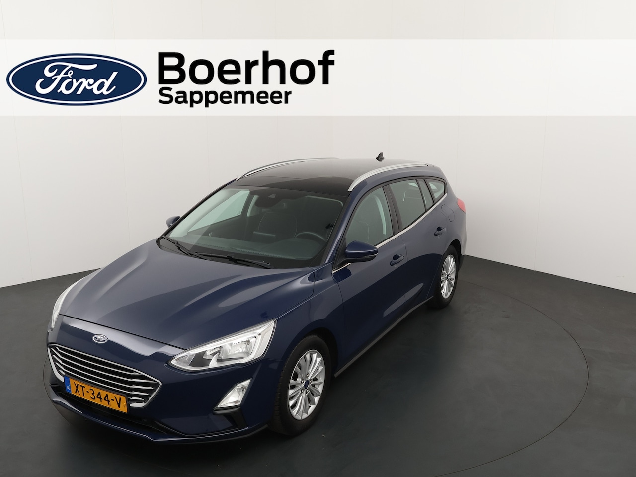 Ford Focus Wagon - EcoBoost 125pk Titanium | Adapt. Cruise | Panorama | B&O | Clima | Dealer onderhouden - AutoWereld.nl