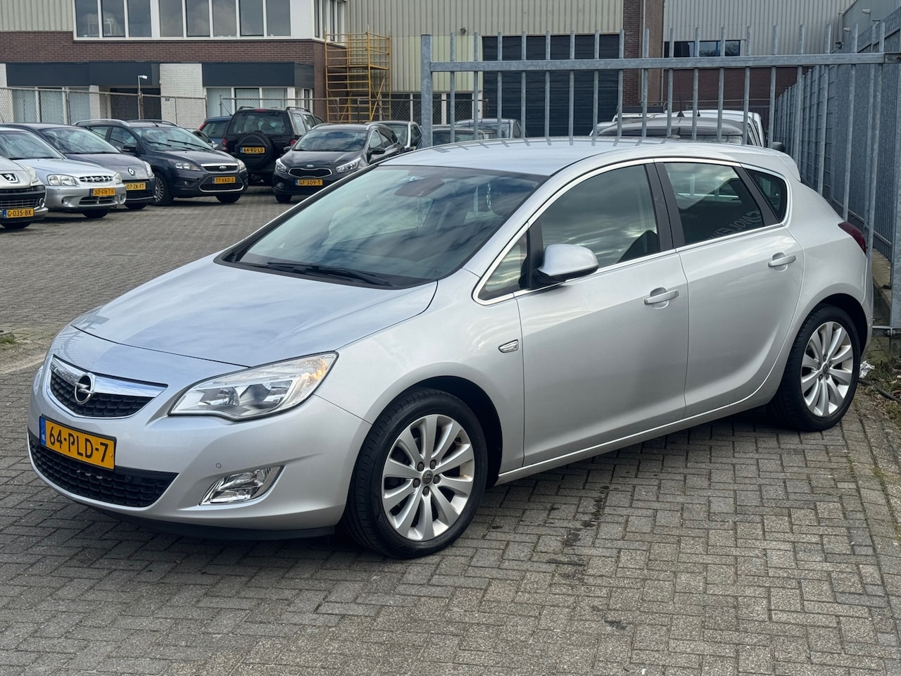 Opel Astra - 1.4 Turbo Cosmo 5 deurs 120PK! Navi l Cruise l Trekhaak l PDC V+A l Leer! DEALER OH l TOPS - AutoWereld.nl