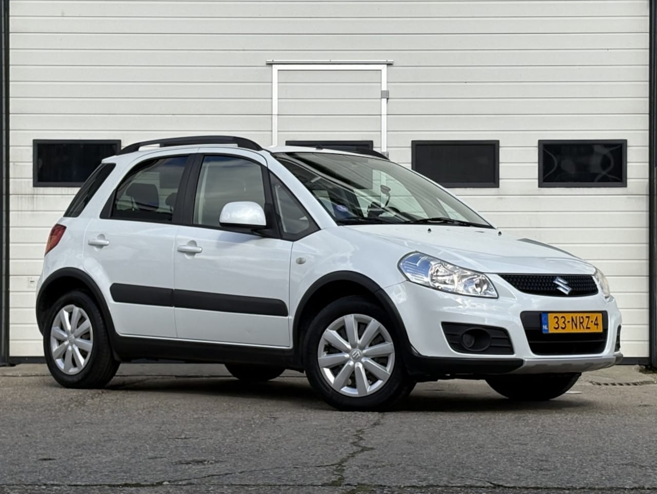 Suzuki SX4 - 1.6 Comfort Airco | Trekhaak | Net binnen - AutoWereld.nl