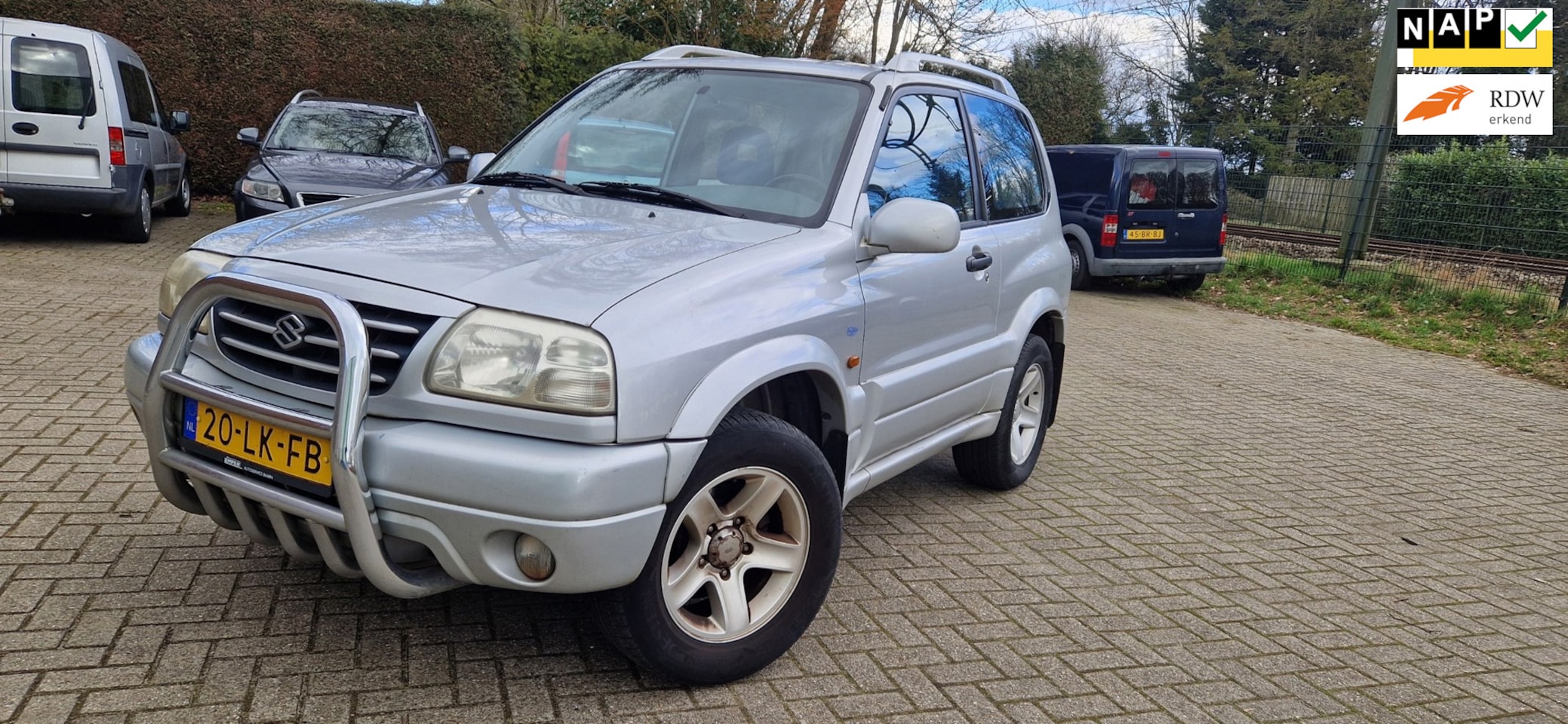 Suzuki Grand Vitara - 2.0 Metal Top Wide Body 2.0 Metal Top Wide Body - AutoWereld.nl