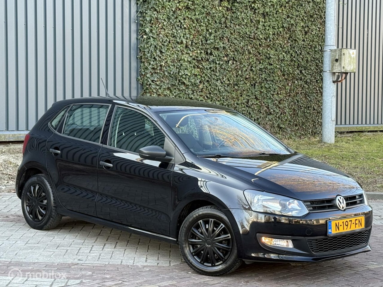 Volkswagen Polo - 1.2 1e Eignr|Camera|Airco|Navi|Lmv|Nap|Boekj - AutoWereld.nl