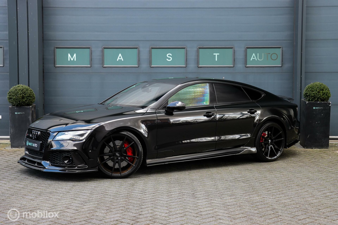 Audi RS7 - 4.0 TFSI quattro|Panterzwart|Carbon|ACC|4x Verwarm| - AutoWereld.nl