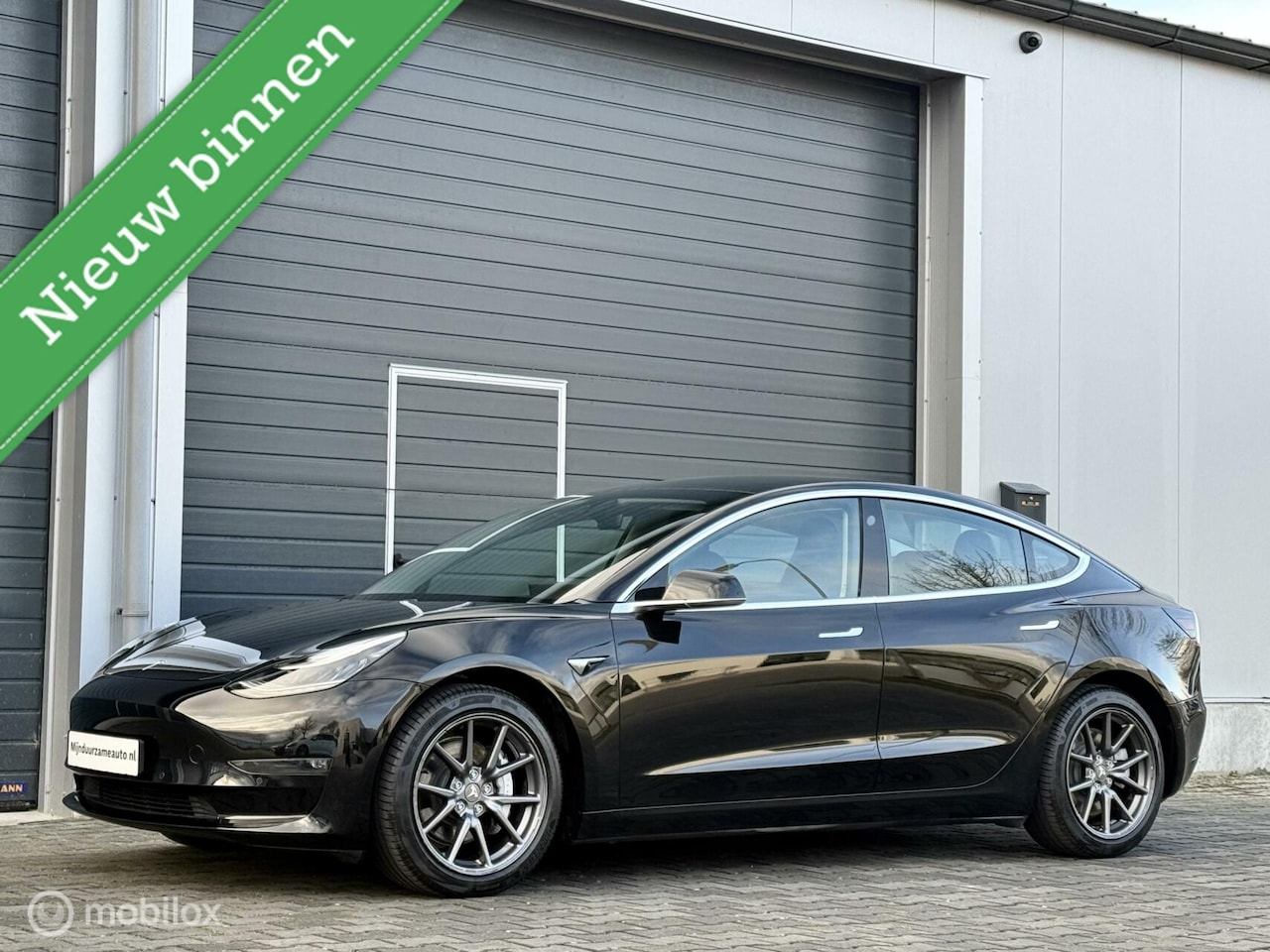 Tesla Model 3 - Long Range RWD Long Range AWD 75 kWh - trekhaak - incl. BTW - AutoWereld.nl