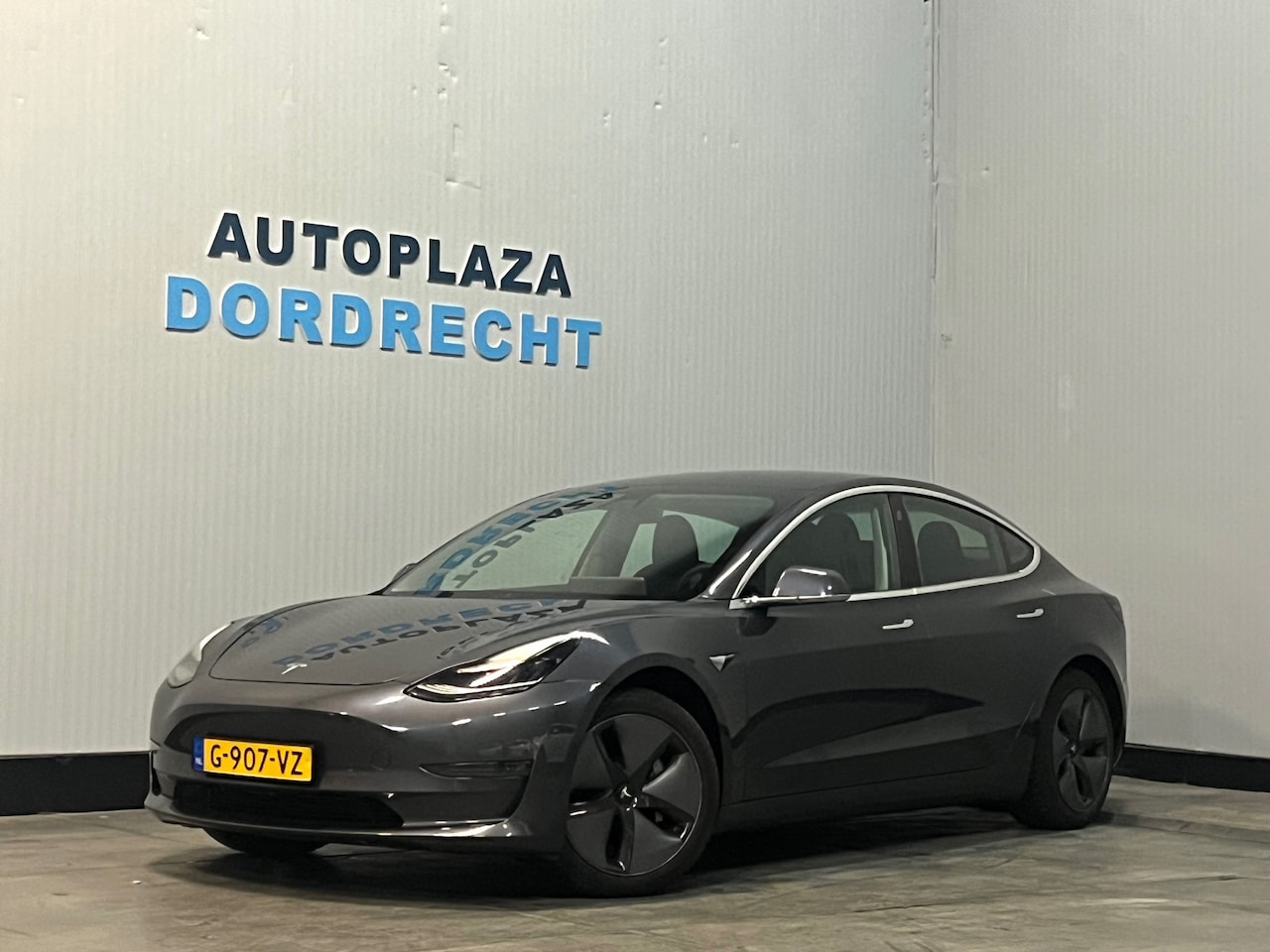 Tesla Model 3 - Long Range RWD Long Range AWD 75 kWh 2x Tesla Long range - AutoWereld.nl