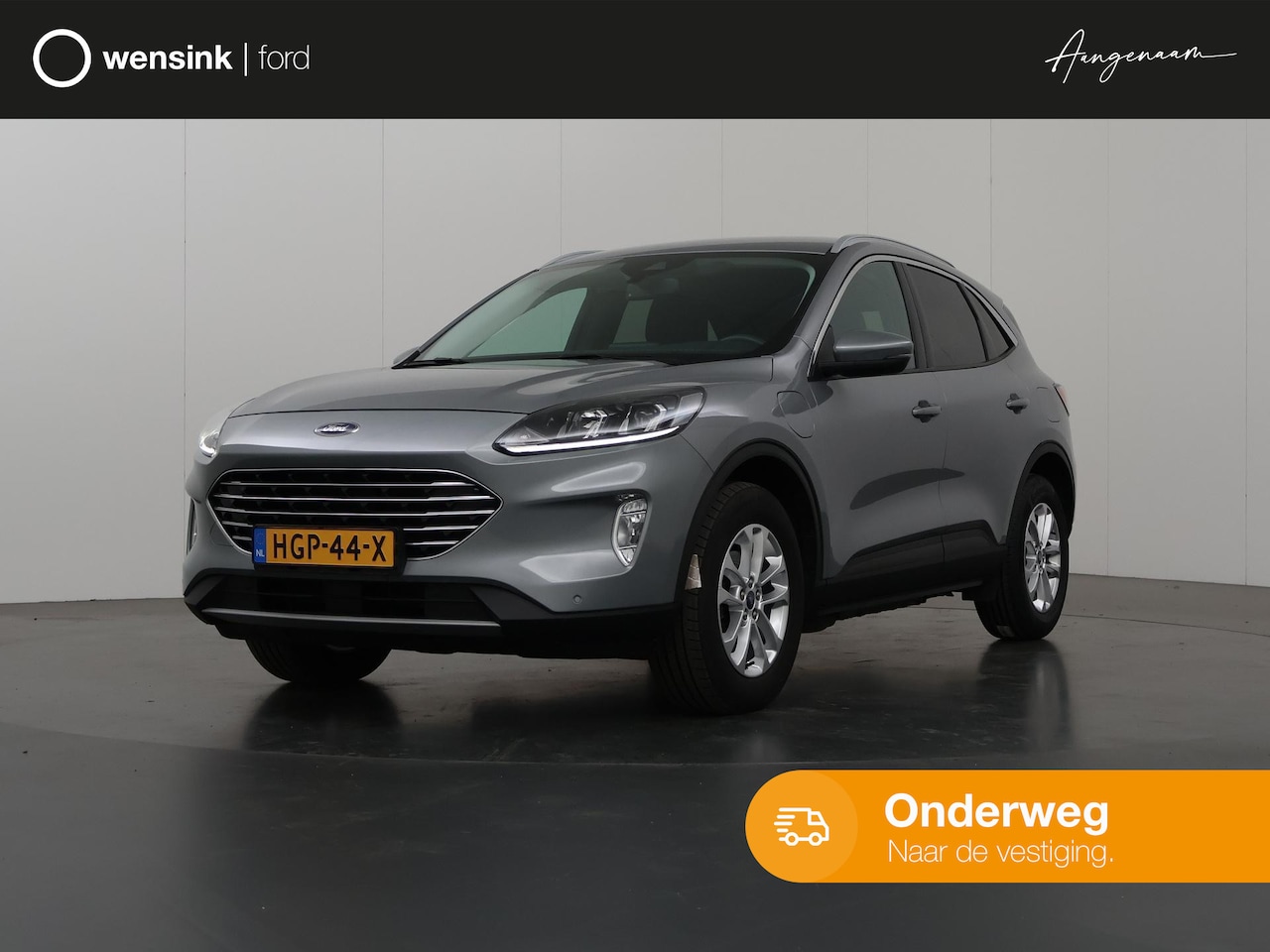 Ford Kuga - 2.5 PHEV Titanium | Navigatie | Winterpack | Parkeercamera | Climate Control - AutoWereld.nl