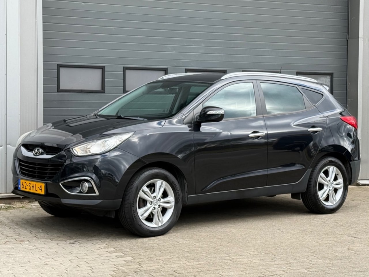 Hyundai ix35 - 2.0 Style 163PK Clima Cruise Half-leer Trekhaak 1900kg - AutoWereld.nl