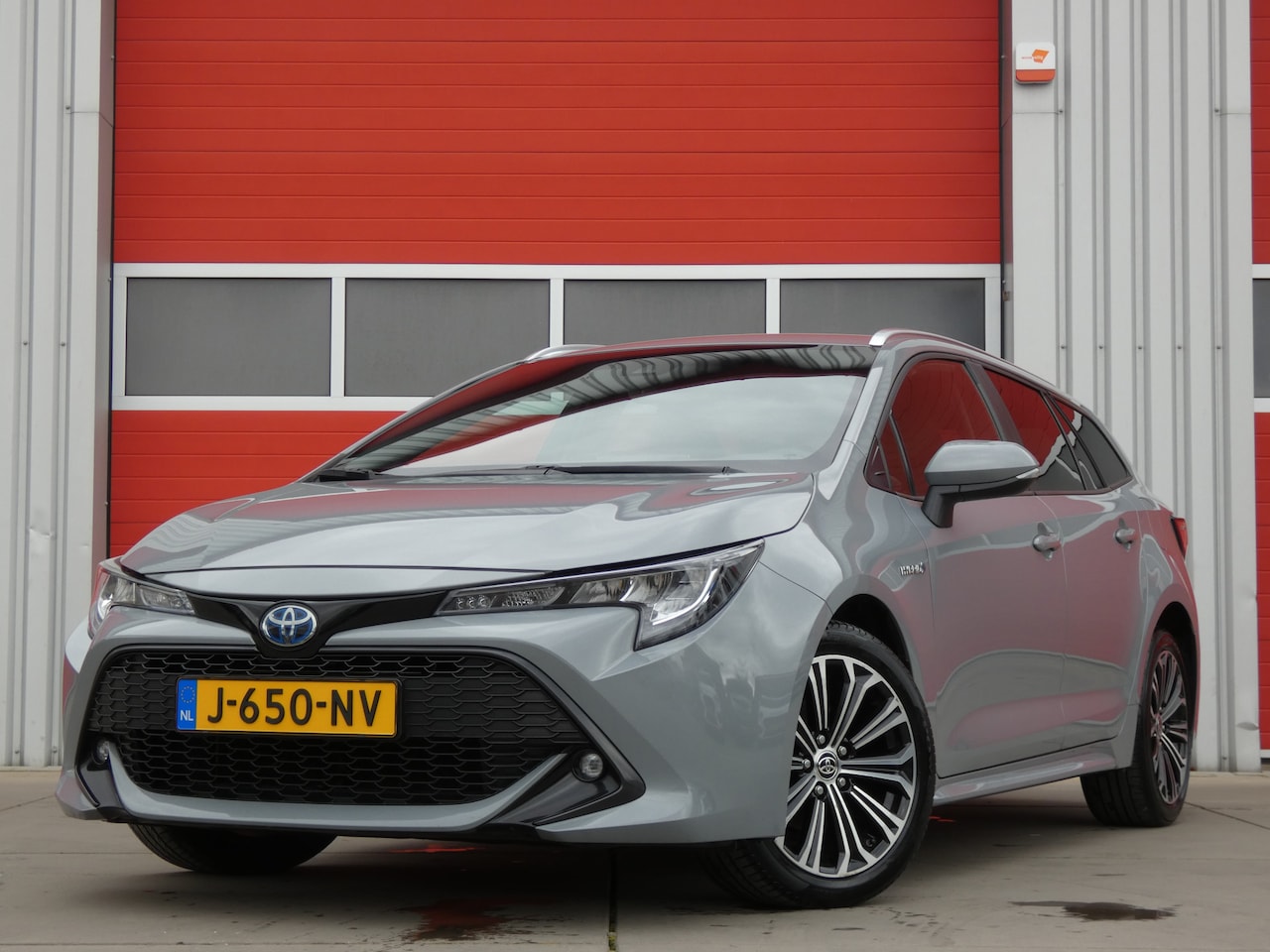 Toyota Corolla Touring Sports - 1.8 Hybrid Business Plus/ lage km/ zeer mooi! - AutoWereld.nl