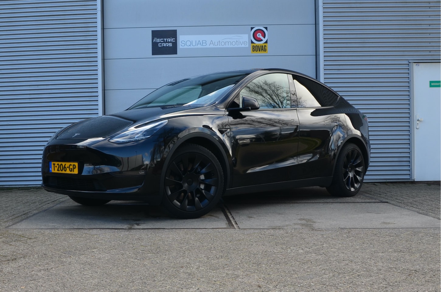 Tesla Model Y - Long Range AWD 75 kWh AutoPilot, Trekhaak (1.600kg) - AutoWereld.nl