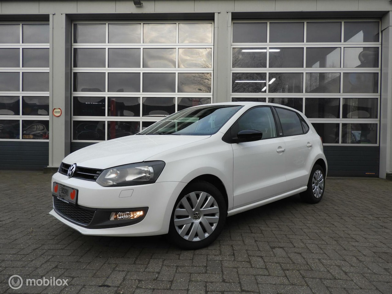 Volkswagen Polo - 1.2 Style - AutoWereld.nl