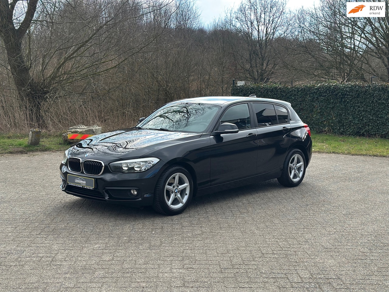 BMW 1-serie - 116i Executive NAVI I NIEUWE BANDEN I PARKEERSEN I WEINIG KM - AutoWereld.nl