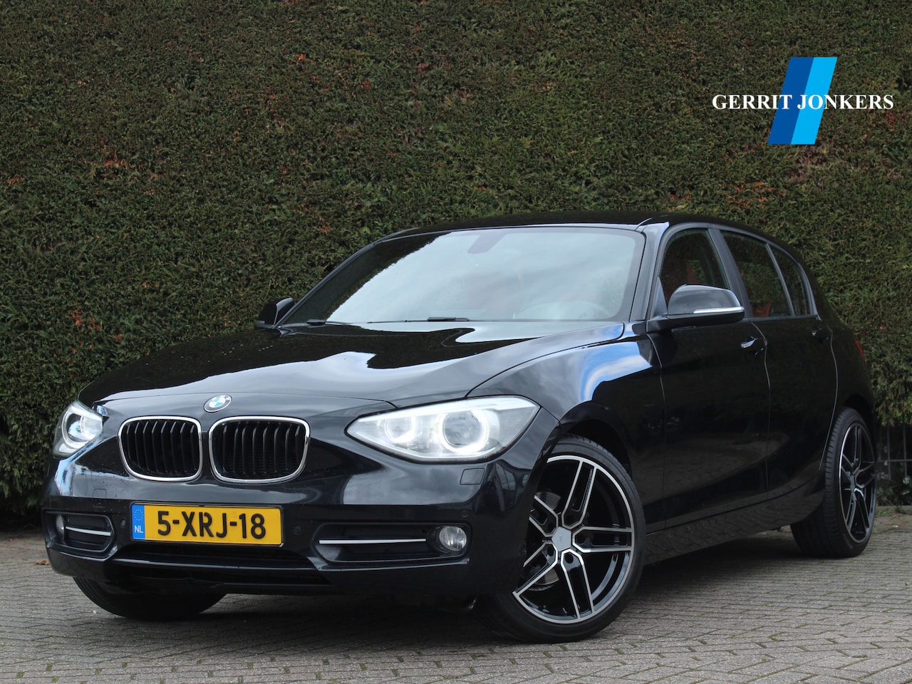 BMW 1-serie - 116i High Executive | Stoelverwarming | Elektr. Stoelen | Xenon - AutoWereld.nl