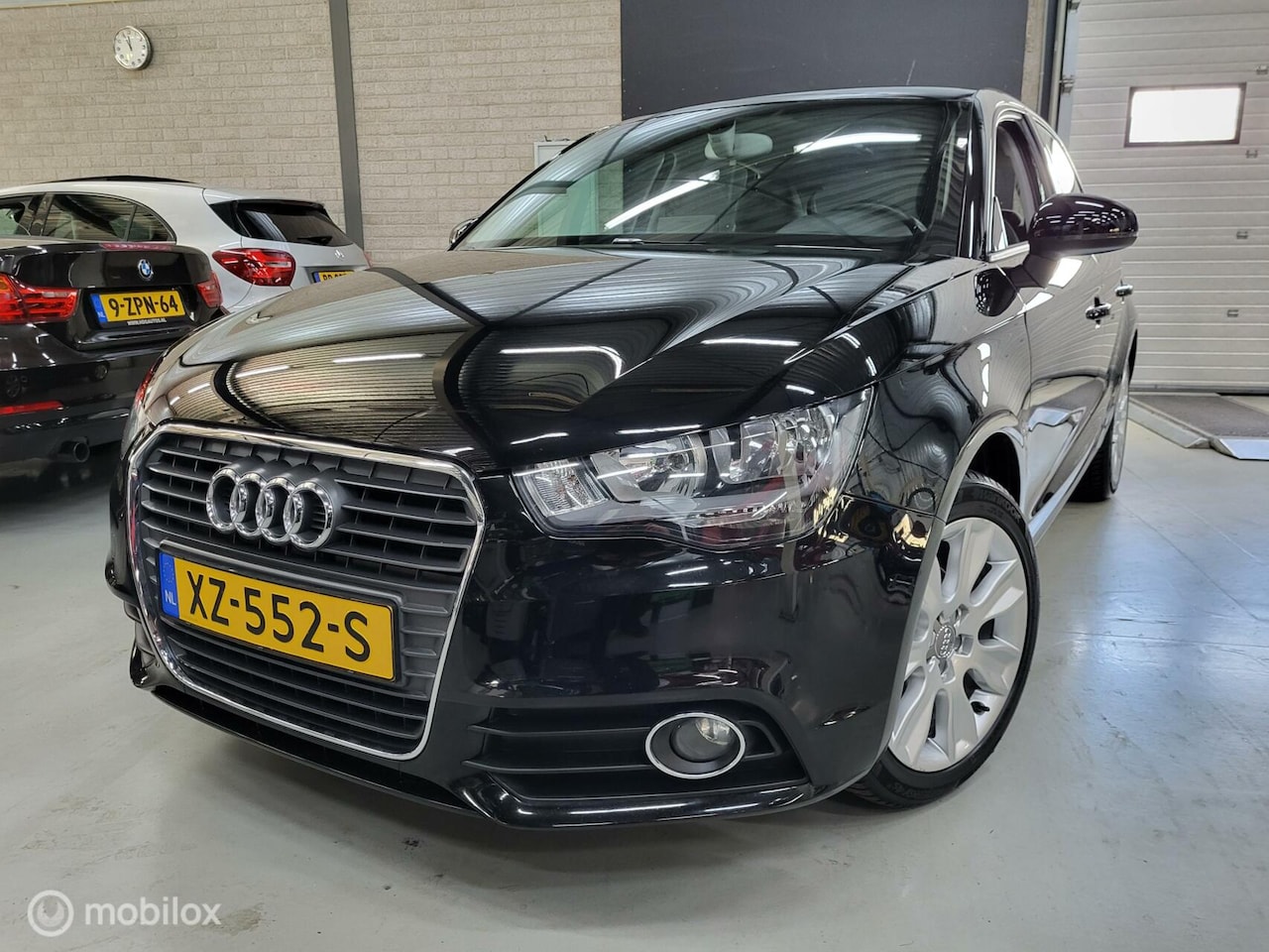 Audi A1 Sportback - 1.2 TFSI Attraction/Navi/Stoelverwarming - AutoWereld.nl