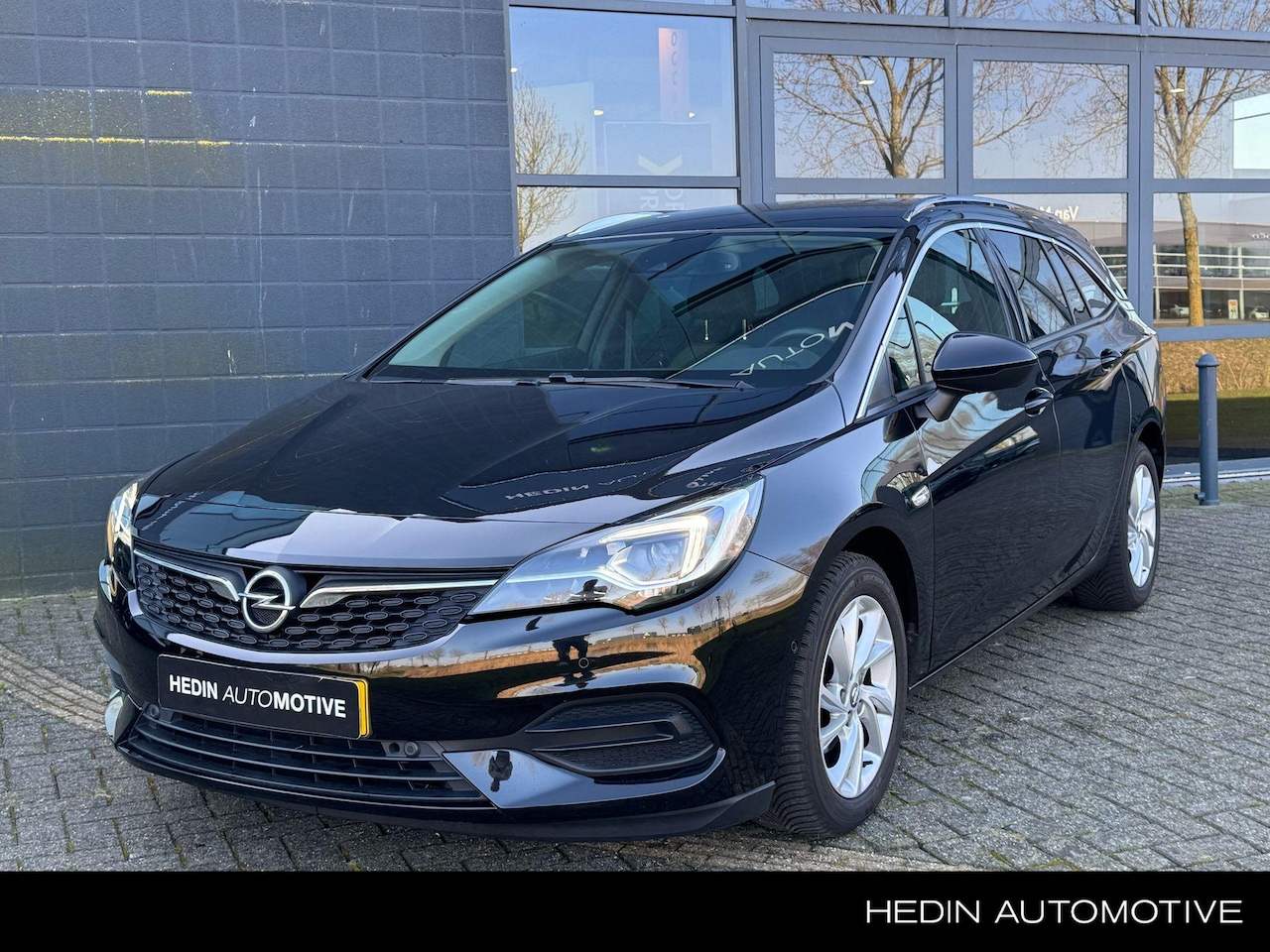 Opel Astra Sports Tourer - 1.2 Elegance Airco | Lm velgen | Navigatie | Carplay | Camera en sensoren | AGR Comfortsto - AutoWereld.nl