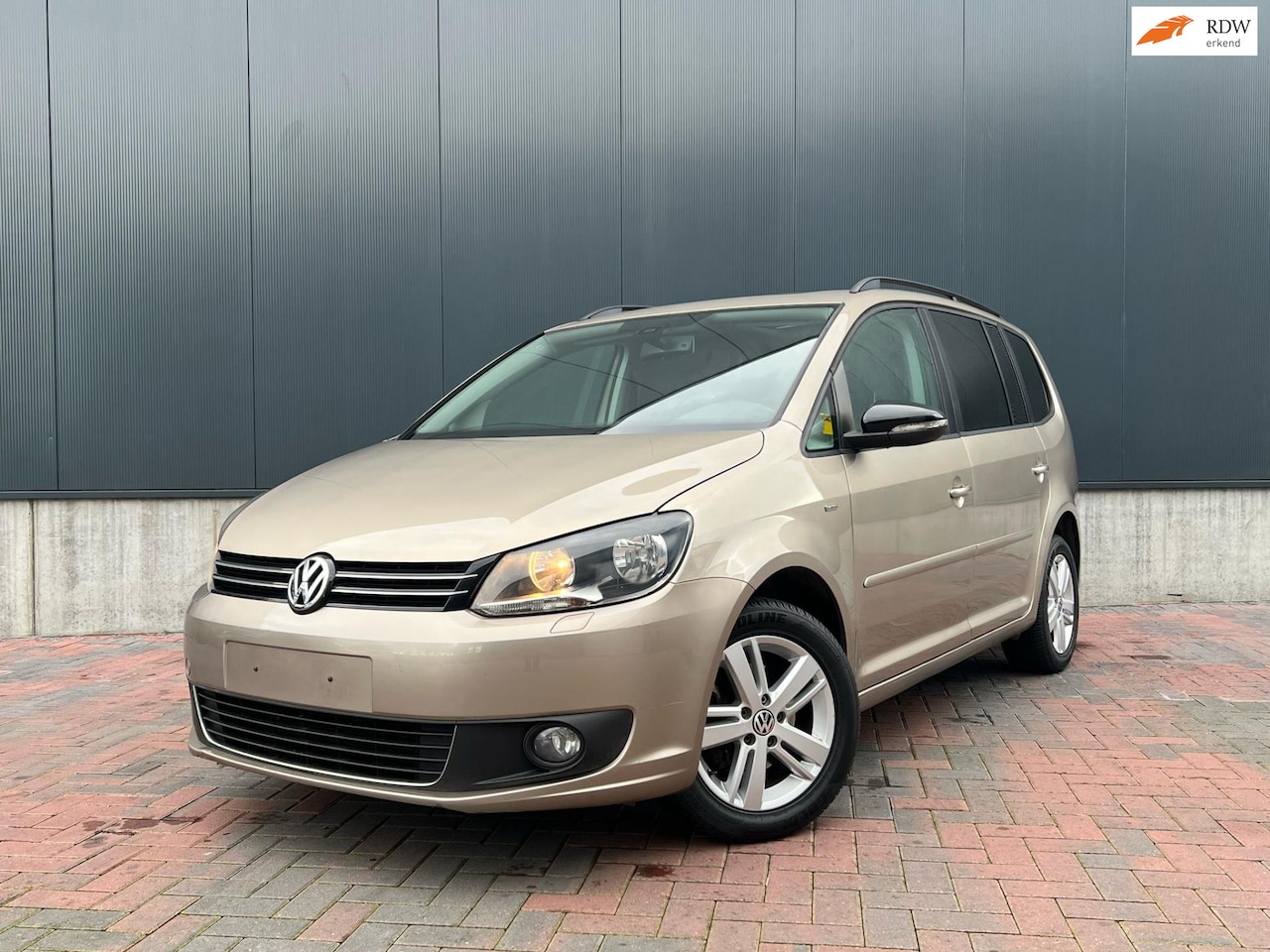 Volkswagen Touran - 1.2 TSI Highline BlueMotion * Navi * Cruise * Pano * Climate * - AutoWereld.nl