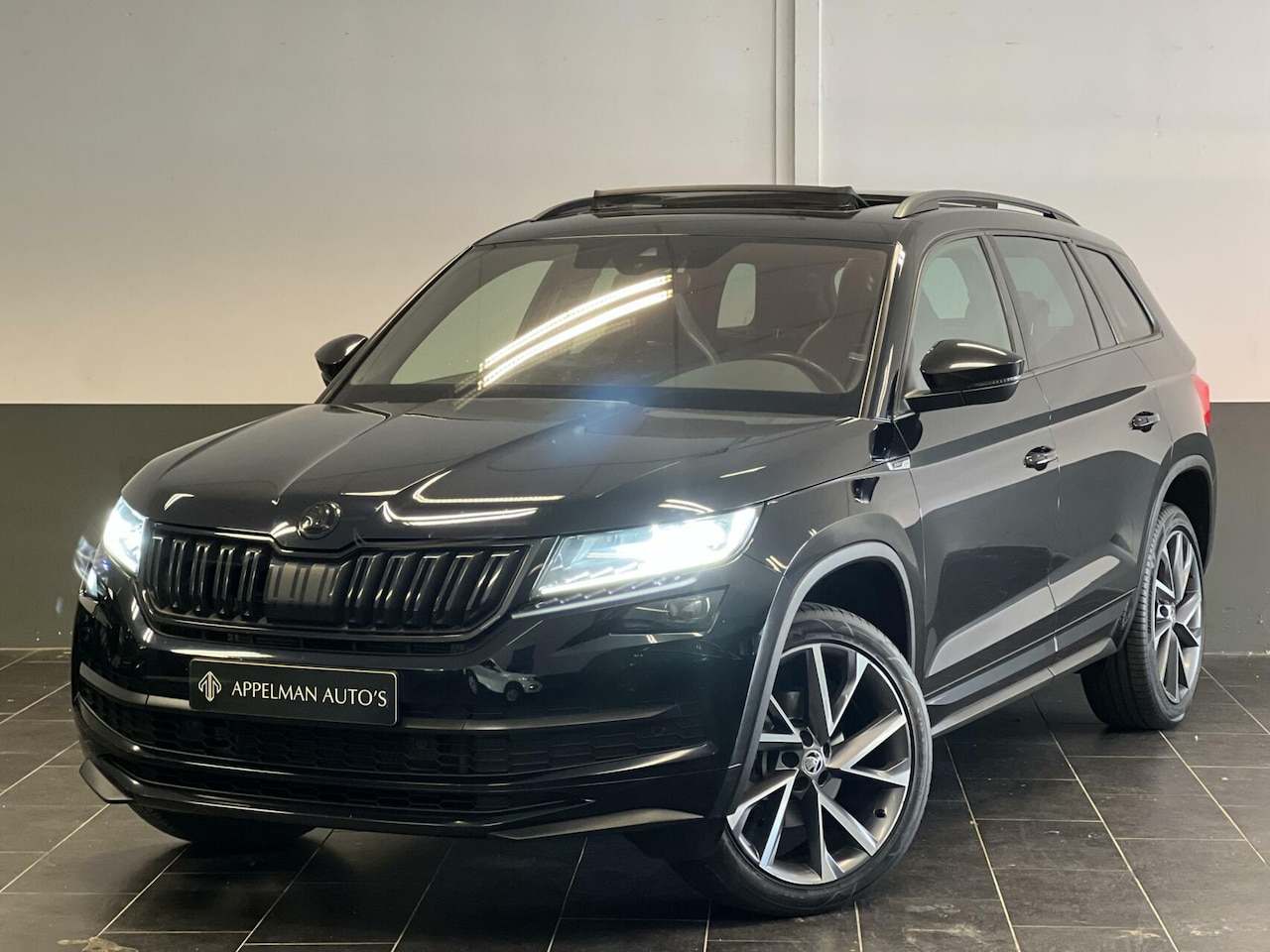 Skoda Kodiaq - 1.5 TSI Sportline Business 7p. | NAP | FULL | Trekhaak | Pano | Keyless - AutoWereld.nl