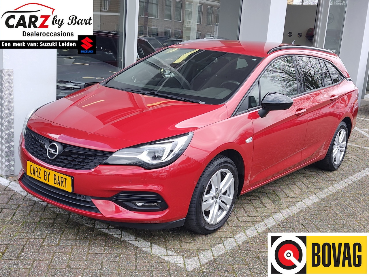 Opel Astra Sports Tourer - 1.2 130PK BLITZ ELEGANCE Trekhaak | Dodehoeksens. | Camera | Keyless - AutoWereld.nl