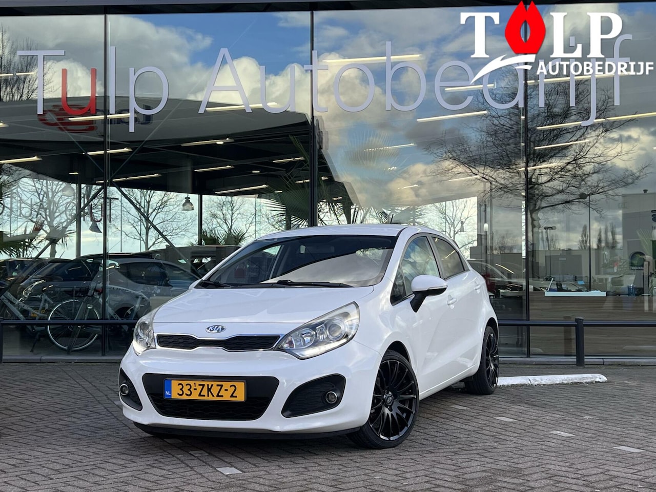 Kia Rio - 1.2 CVVT Design Edition 2013 Clima Navi - AutoWereld.nl