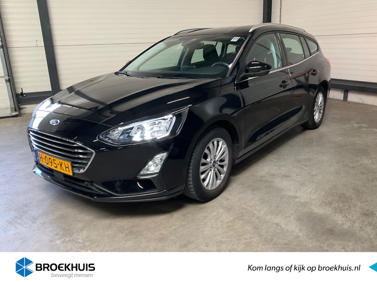 Ford Focus Wagon - 1.0 EcoBoost Titanium Business | Climate Control | Navigatie | Cruise Control | Parkeersen - AutoWereld.nl