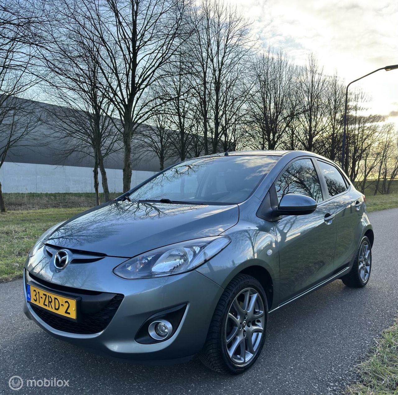 Mazda 2 - 1.3 BIFUEL GT*LPG*NEW APK*STOELVERWARMING*SCHERM*NAP - AutoWereld.nl