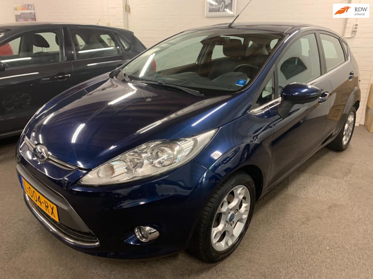 Ford Fiesta - 1.25 Trend titanium airco clima - AutoWereld.nl