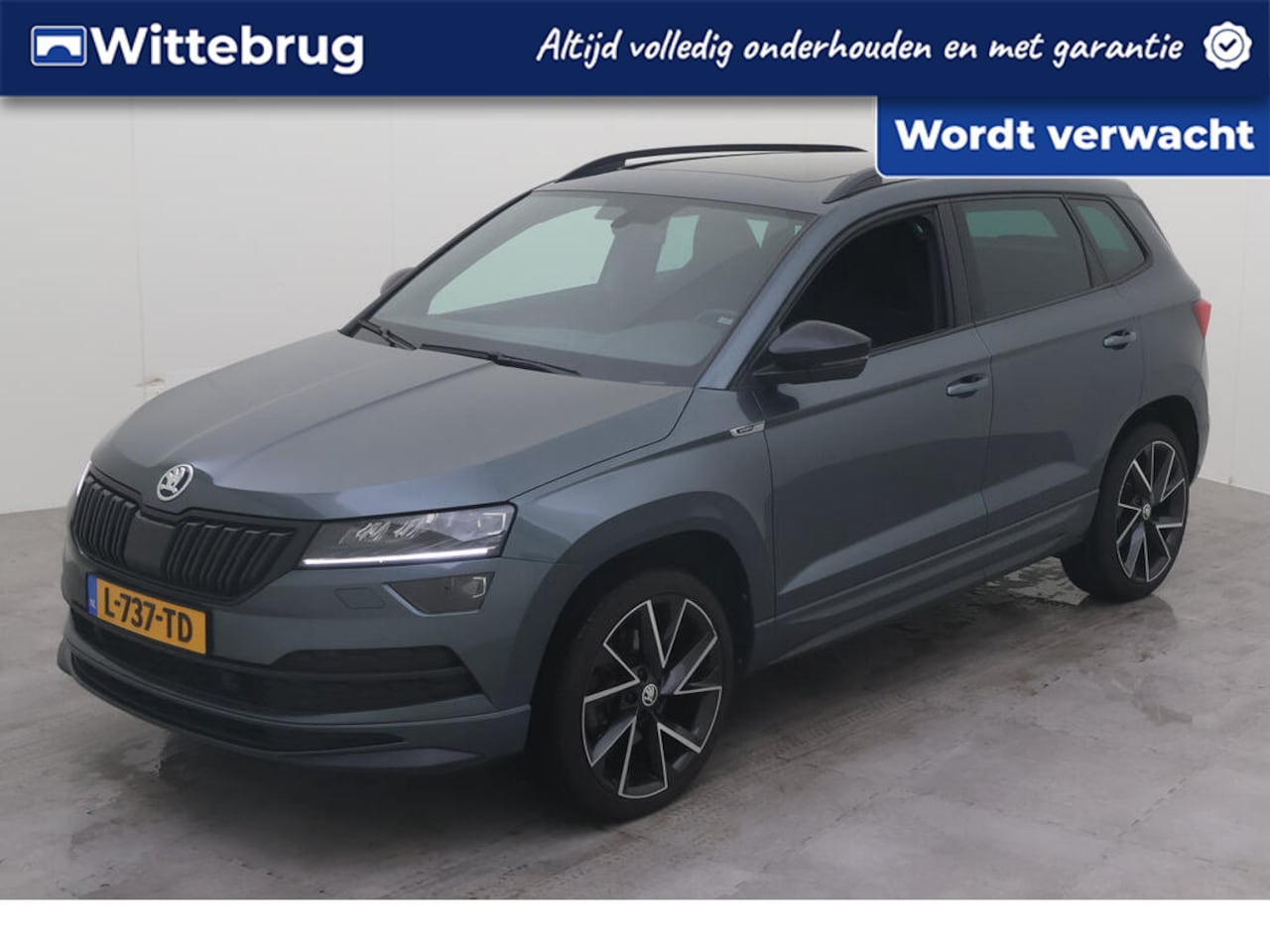 Skoda Karoq - 1.5 TSI ACT Sportline Business DSG/ Metallic/  digitale Cockpit/ /  Led/ Haak Afneembaar/ - AutoWereld.nl