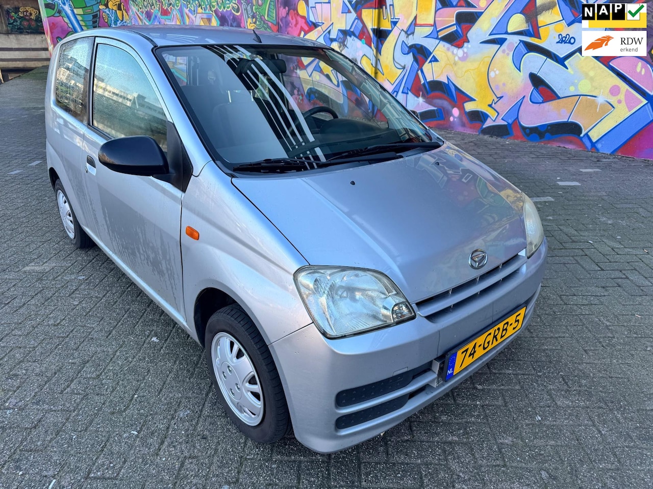 Daihatsu Cuore - 1.0-12V 100th Anniversary super nette auto rijd perfect voorzien van stuurbekrachtiging st - AutoWereld.nl