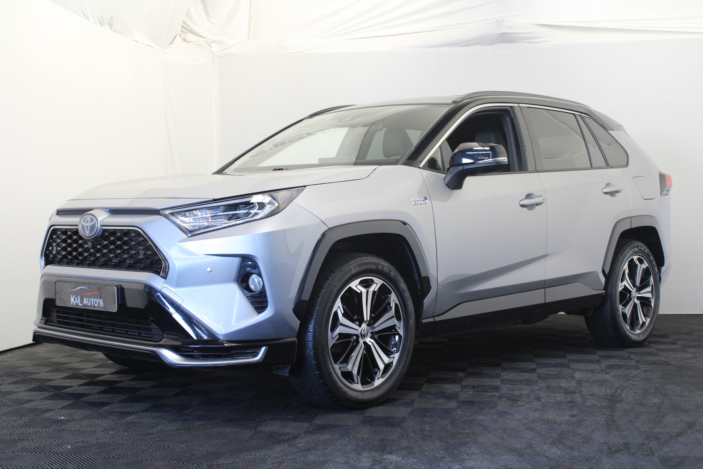 Toyota RAV4 - 2.5 Plug-in Hybrid AWD Bi-Tone Plus |Stoelkoeling\verwarming|HUD|Leder| - AutoWereld.nl